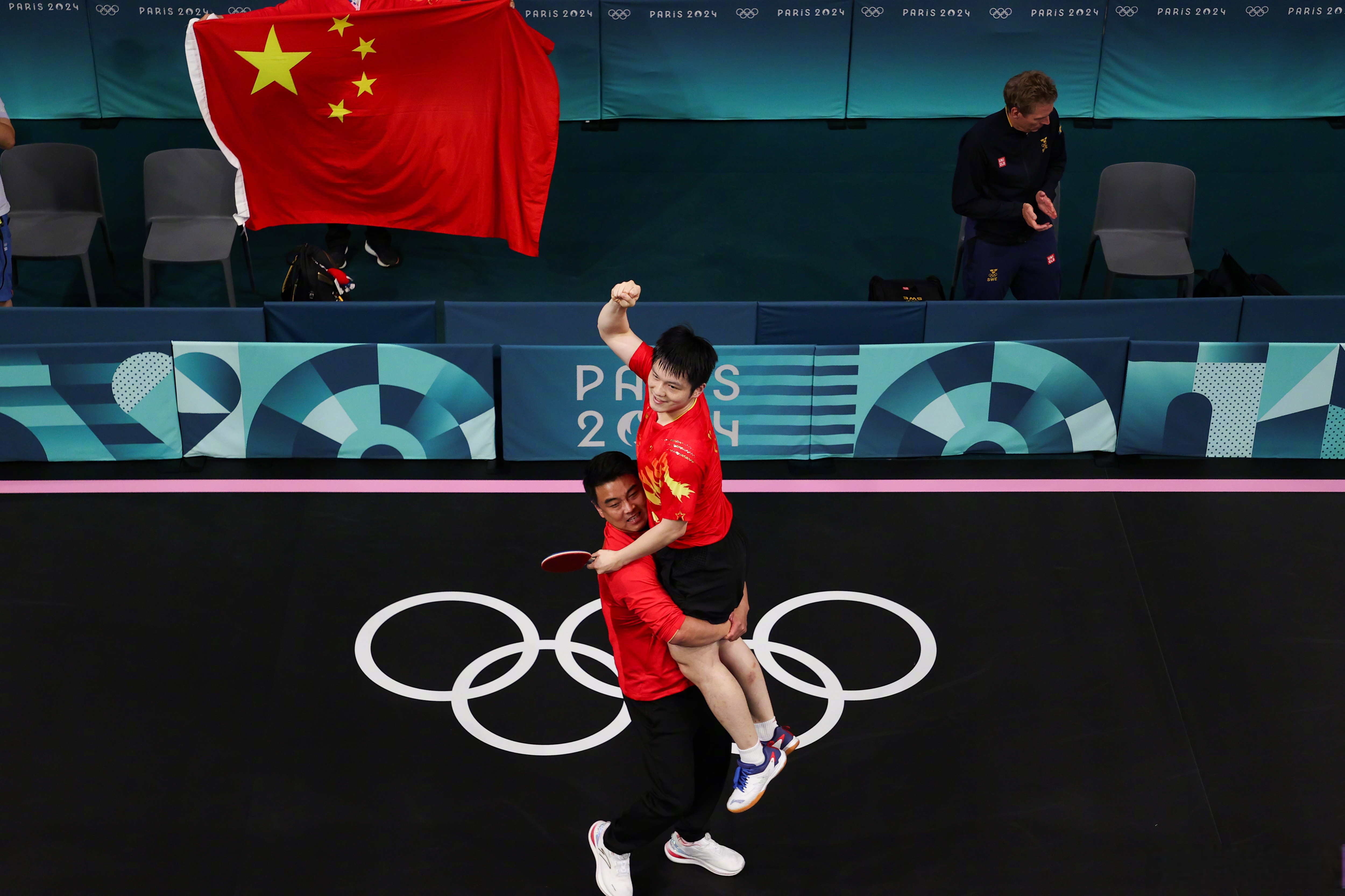 中国乒乓球队险胜奥地利乒乓球队,樊振东完成帽子戏法 中国乒乓球队险胜奥地利乒乓球队,樊振东完成帽子戏法